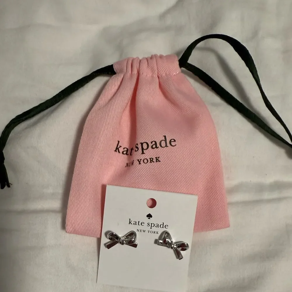 Kate Spade NIP Silver tone Bow Earrings! Come with the dust bag 🎀